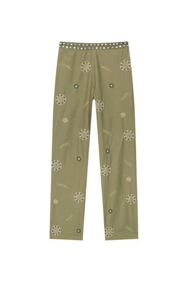 Trousers with mirror embroidery