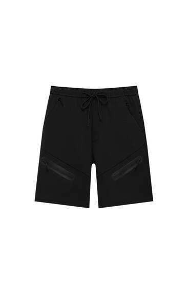 Plush jogging Bermuda shorts with front pocket
