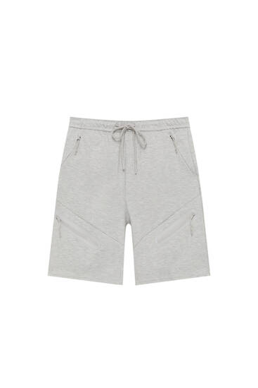 Plush jogging Bermuda shorts with front pocket