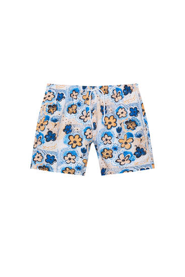 Blue floral print swimming trunks