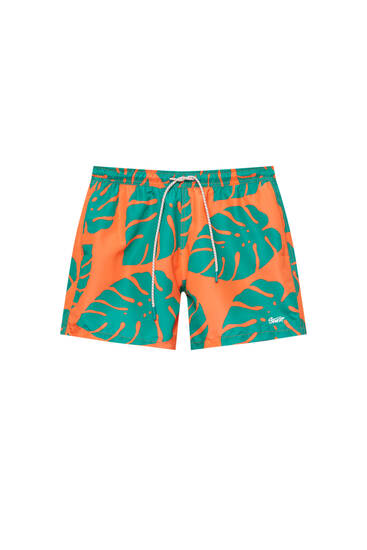 Palm tree print swimming trunks