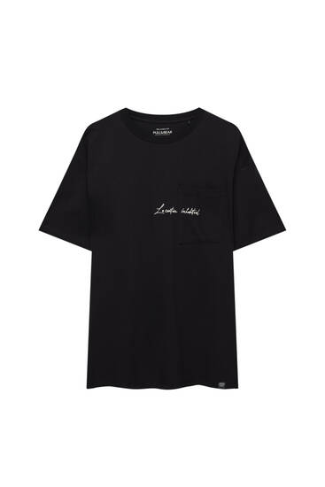 Black T-shirt with embroidered chest detail