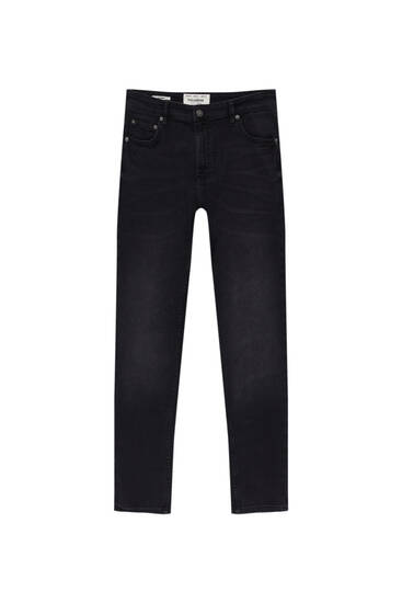 Black carrot-fit jeans with a faded finish