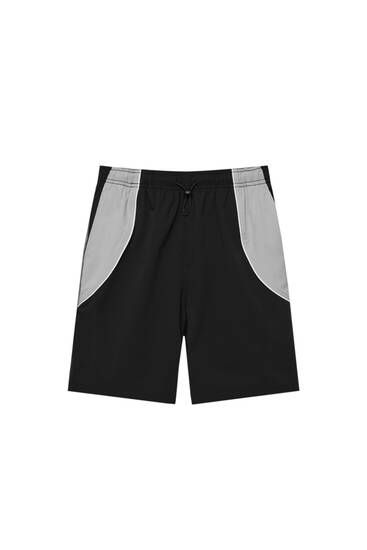 Black Bermuda shorts with grey panels
