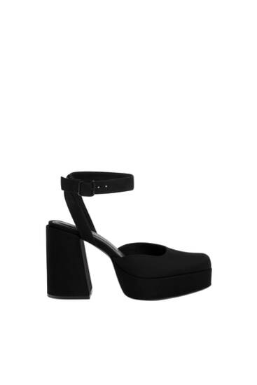 Platform heeled slingback shoes
