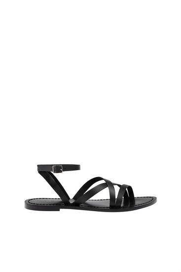 Flat leather strappy sandals