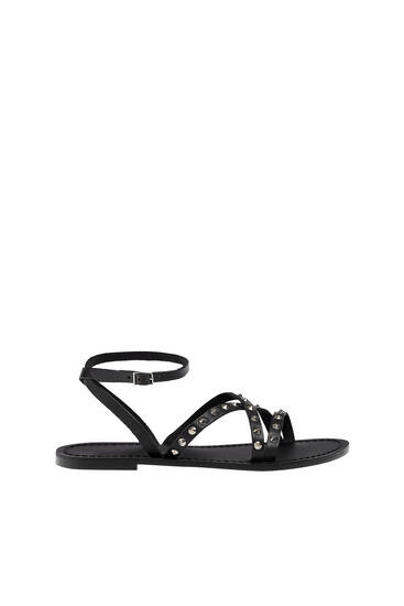 Flat leather sandals with embellished detail
