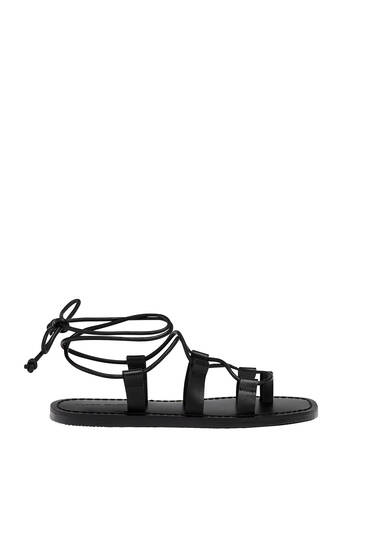 Flat strappy leather sandals