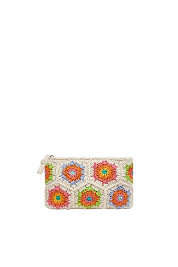 Mini crochet toiletry bag with flowers