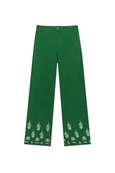 Rustic trousers with embroidery