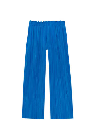 Flowing trousers with box pleats
