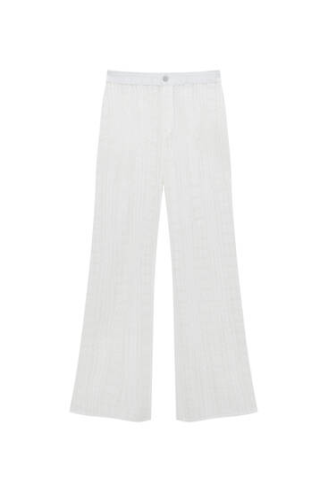 White openwork knit trousers