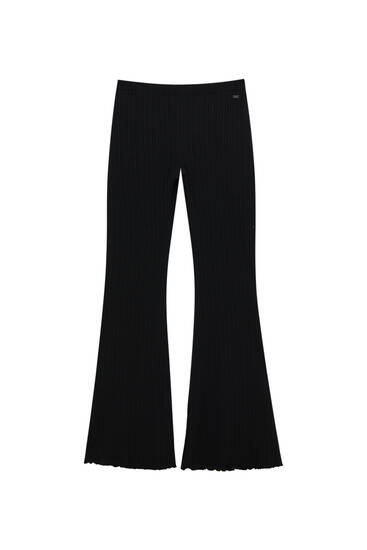 Black flared trousers in ribbed fabric