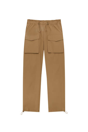 Parachute trousers with front pockets