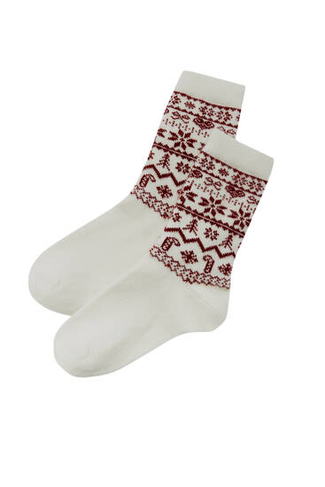 Κόκκινες μάλλινες χριστουγεννιάτικες κάλτσες