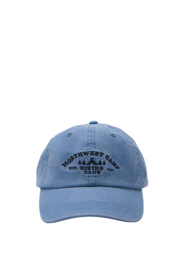 Faded cap with blue slogan