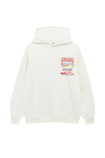 White hoodie with neon sign graphic