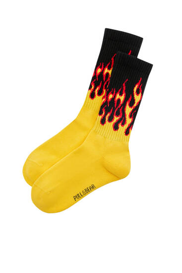Lange Socken mit Flammen in Kontrastfarbe