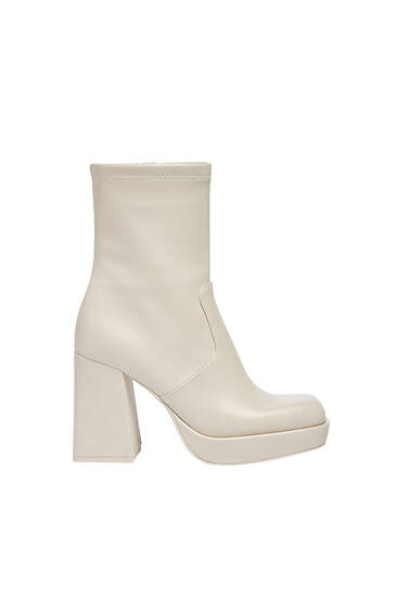Stretch heeled ankle boots