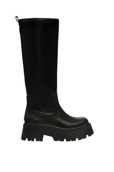 Knee-high boots with track sole