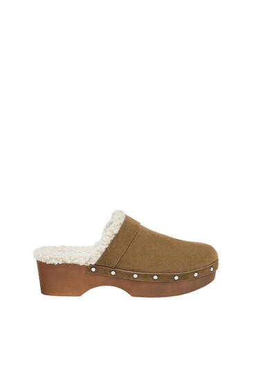 Leather clogs with faux shearling lining