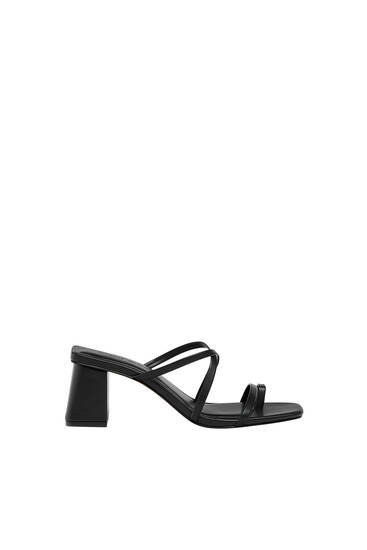 Mule sandals with straps