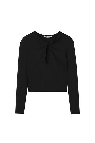 Long sleeve top with cut-out detail