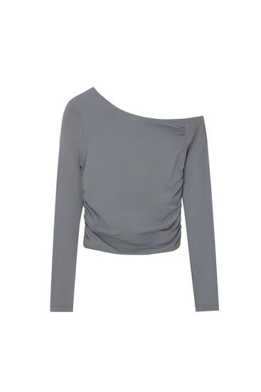 Asymmetric long sleeve top with draping