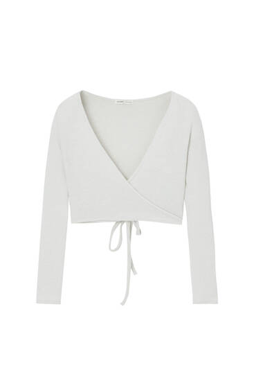 Soft knit surplice top with tie detail