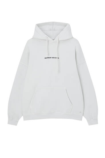 Hoodie with embroidered slogan
