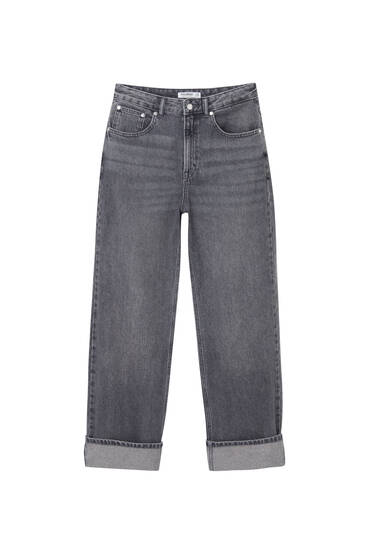 Voľné vrecovité džínsy s vyhrnutým lemom