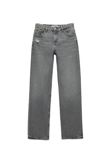 Jeans hot sale bottone storto