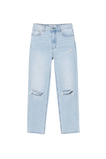 Jeans strappo store sul sedere