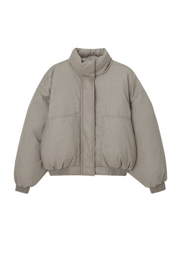 Puffer jacket with a high collar