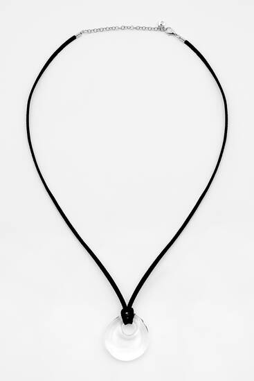 Cord necklace with a transparent pendant