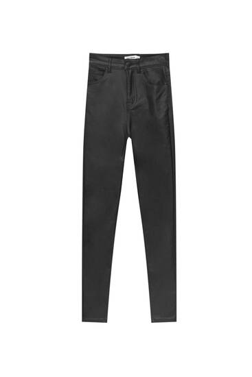 High-waist skinny trousers with a coated finish