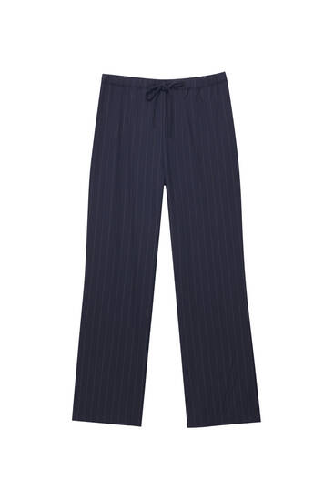 Flowing trousers with elastic waistband