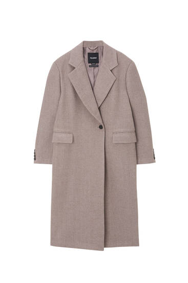 Long coat with pleat at the back.