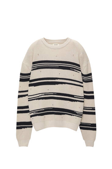 Striped knit jumper with rips