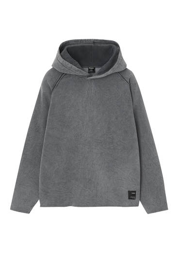 Washed hoodie with hem detail