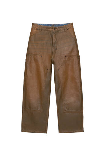 Brown waxed jeans