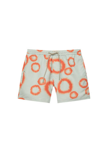 Orange tie-dye swimming trunks