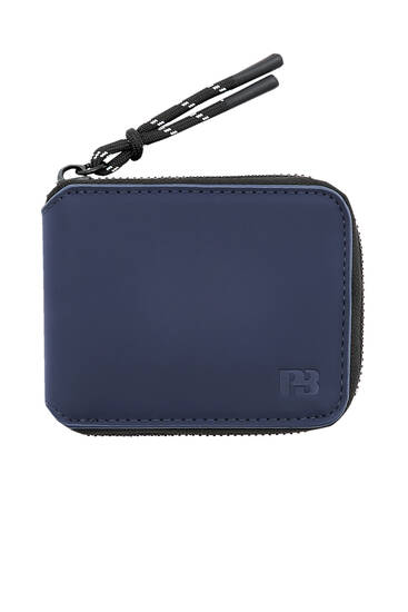 Marinblå plånbok i gummi med dragkedja
