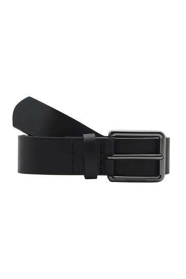 Black belt with a logo buckle