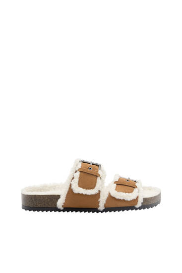 Leather sandals with faux shearling