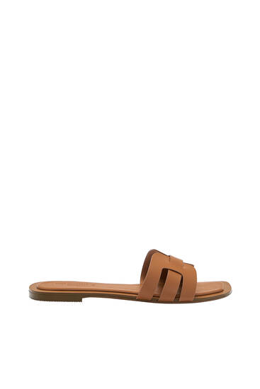 Flat crossover sandals