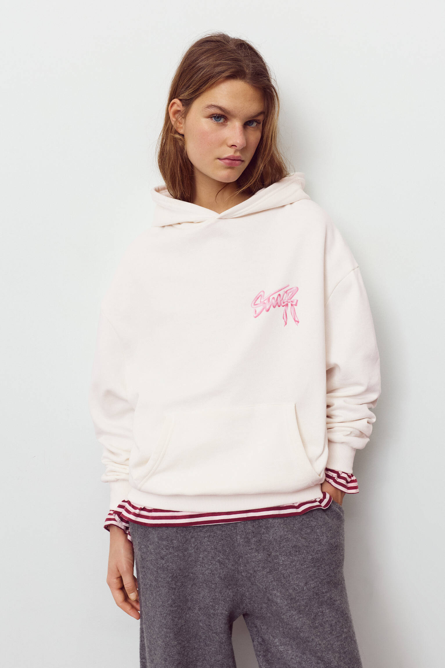 Sweat à capuche motif nœud