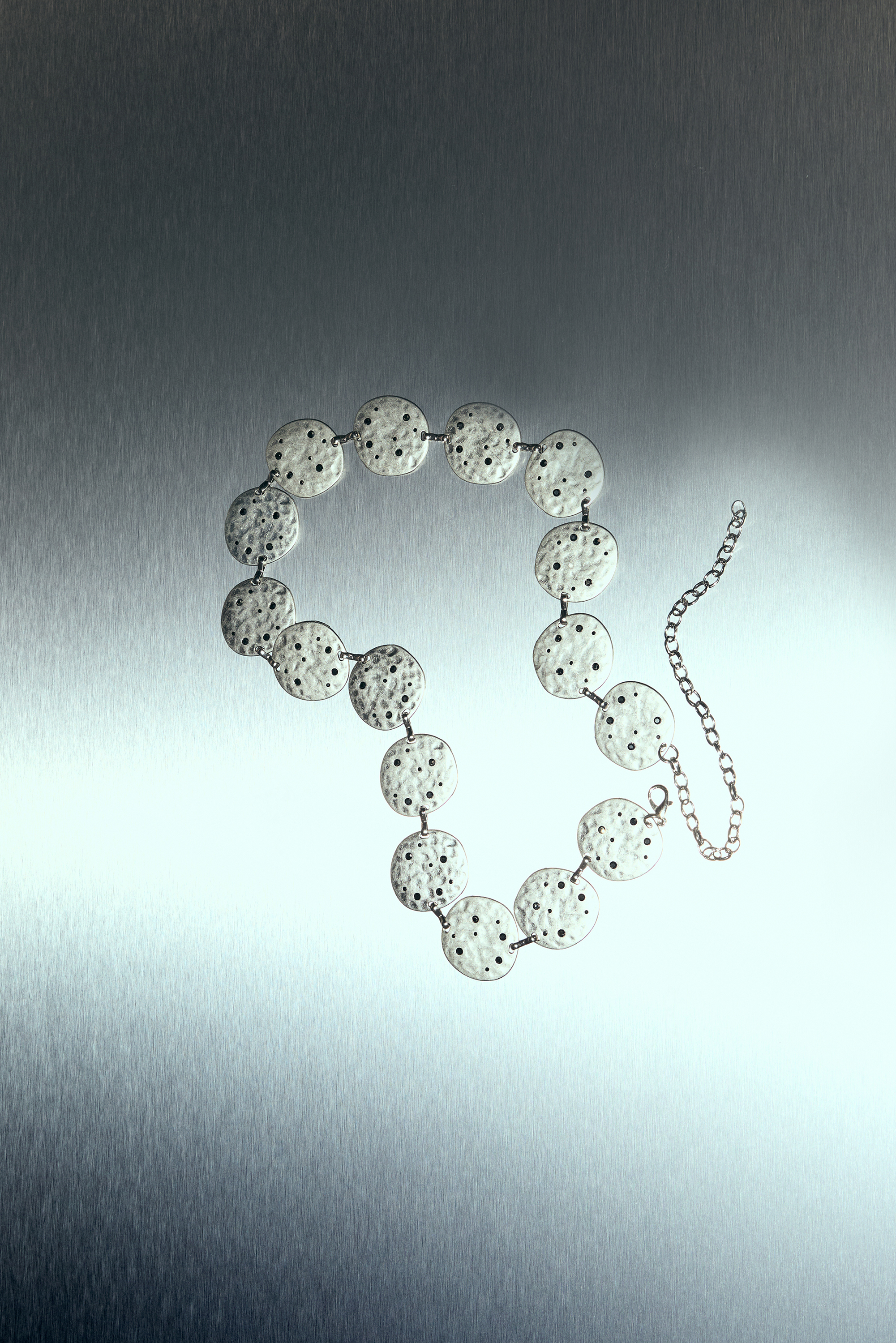 Shimmery circle chain belt