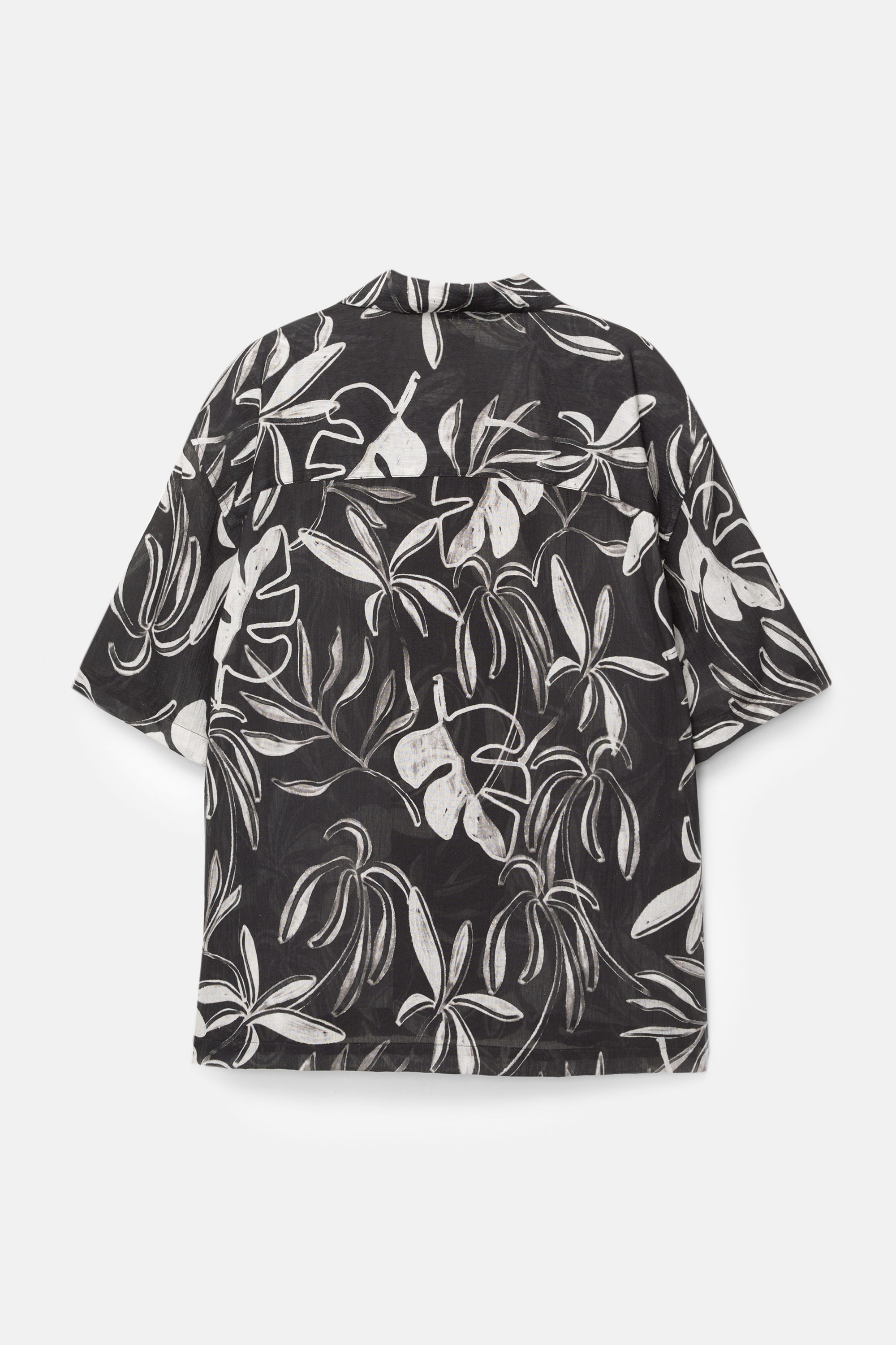 Chemise manches courtes noire feuilles