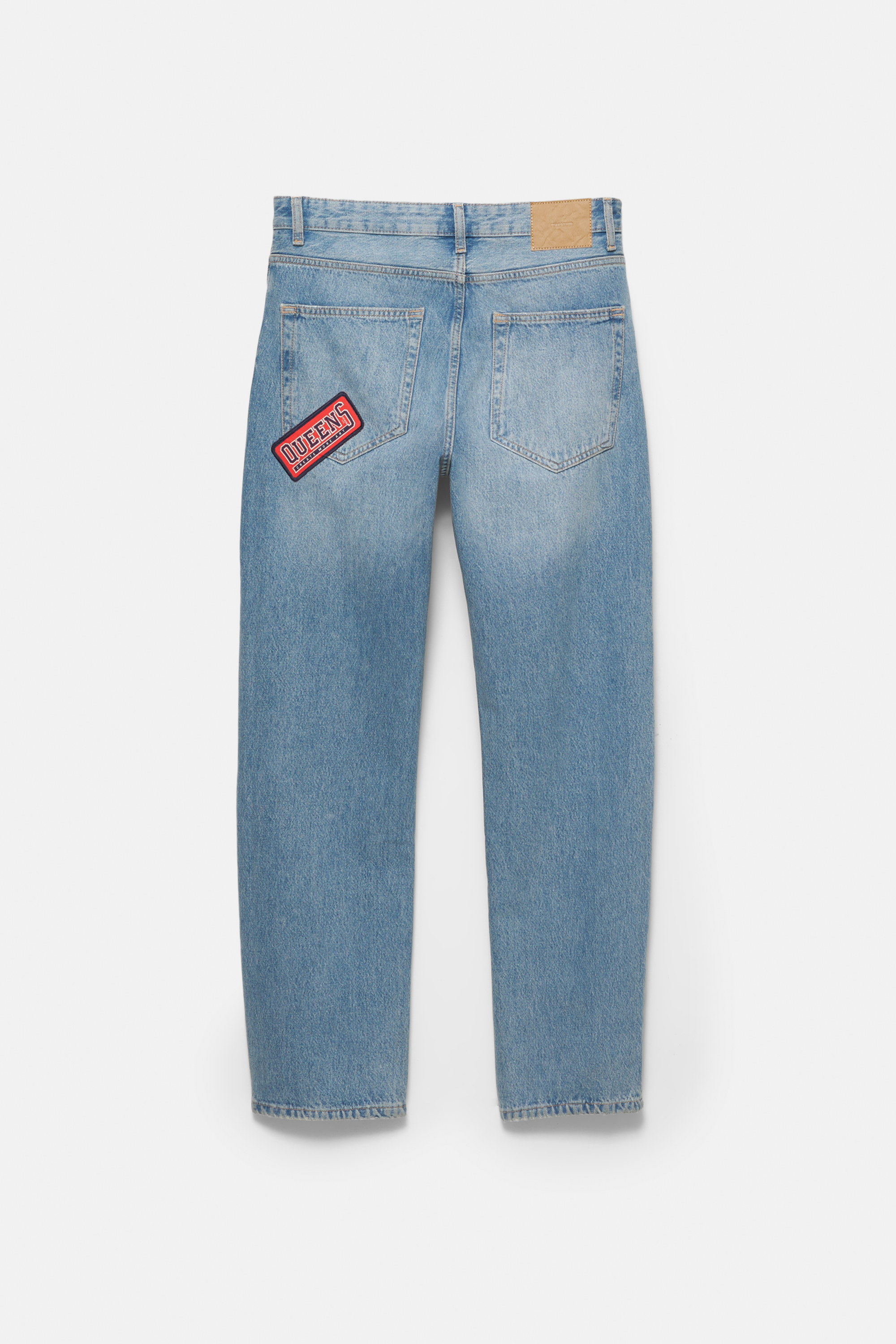 Taisnas džinsu bikses ar aplikācijām